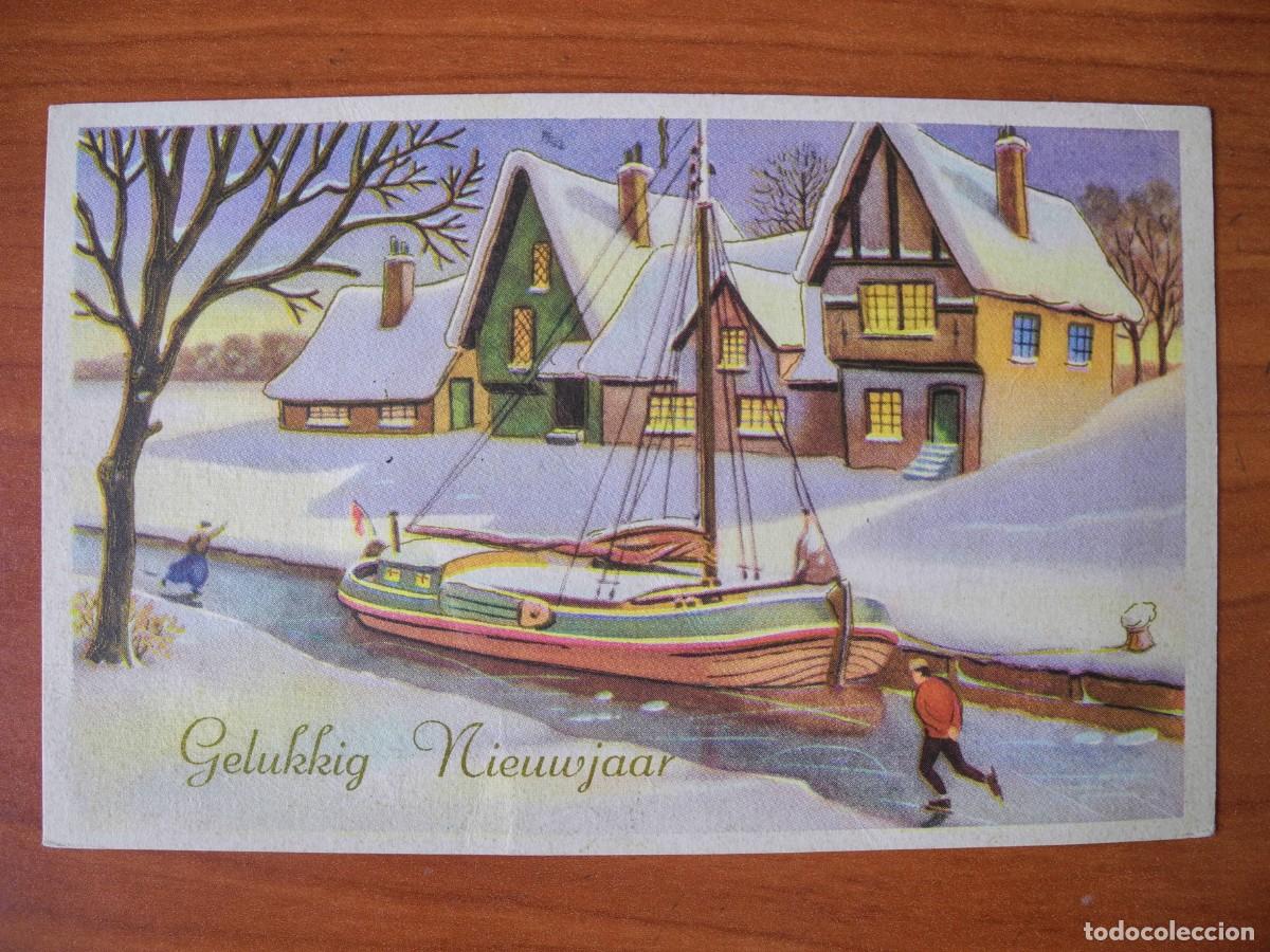 Postais: Navidad Paisaje nevado R&iacute;o Barca Personas Patinando Trazos dorados Circulada con sello 1975 14x9