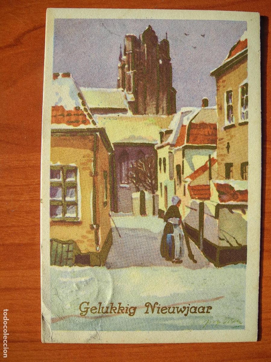 Postais: Navidad ciudad nevada. Iglesia persona. Trazos dorados Circulada con sello 1952 9x14