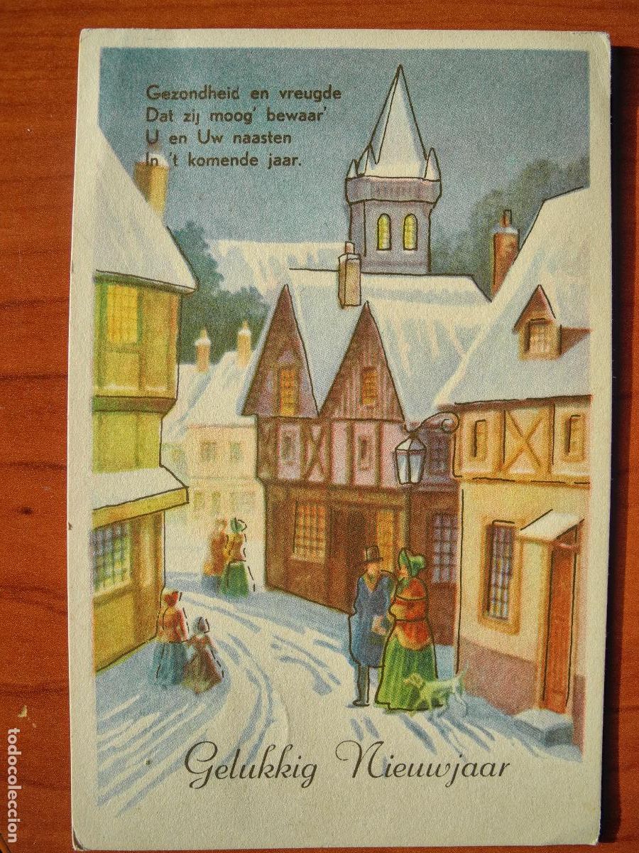 Postais: Navidad ciudad nevada. Iglesia personas paseando. Trazos dorados Circulada con sello 9x14