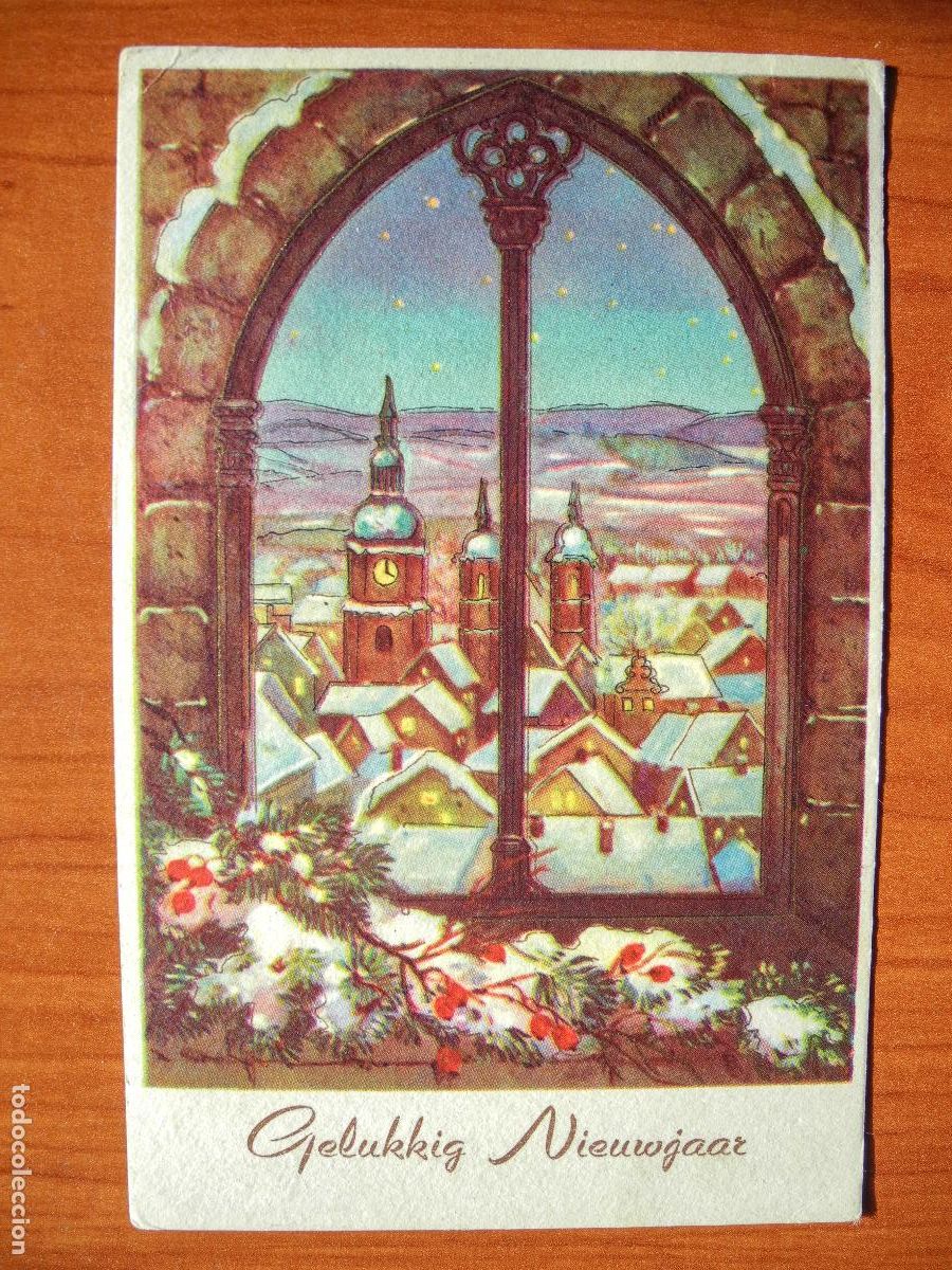 Postcards: Navidad. Paisaje nevado. Casas. Iglesia. Ventana. Trazos dorados. Circulada con sello 9x14