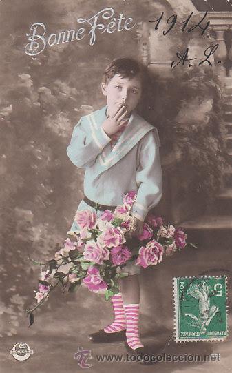 Postales: ni&ntilde;o con flores, escrita en 1914 - Foto 1