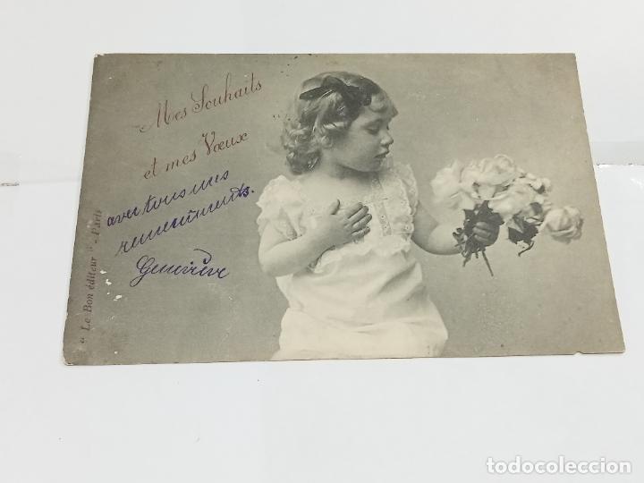 Cartes Postales: TARJETA POSTAL. NI&Ntilde;A CON MANO EN EL PECHO Y RAMO DE ROSAS