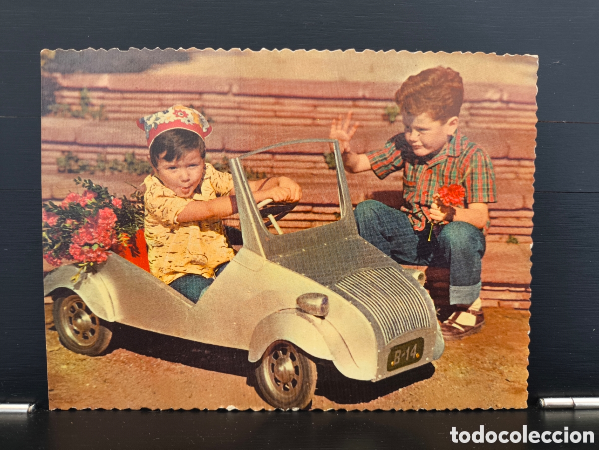 Postales: Postal fotogr&aacute;fica retrato ni&ntilde;o ni&ntilde;a flores jugando con coche de juguete Ed. Ancla 3022