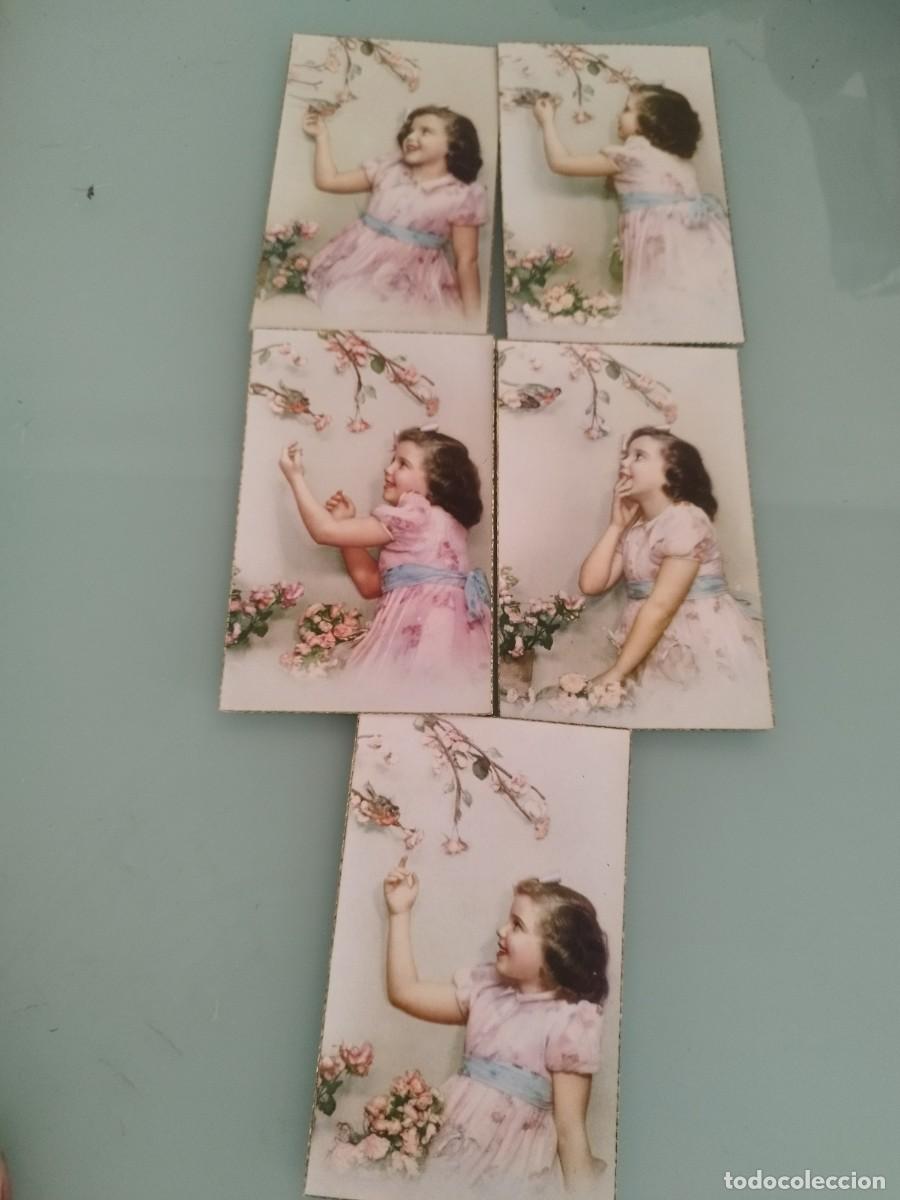 Postales: 5 antiguas tarjetas postales ni&ntilde;a con un vestido rosa en distintas poses con pajaritos y flores.