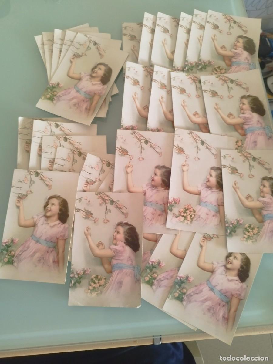 Postales: Lote de 30 antiguas tarjetas postales, de una ni&ntilde;a con vestido rosa cogiendo flores.