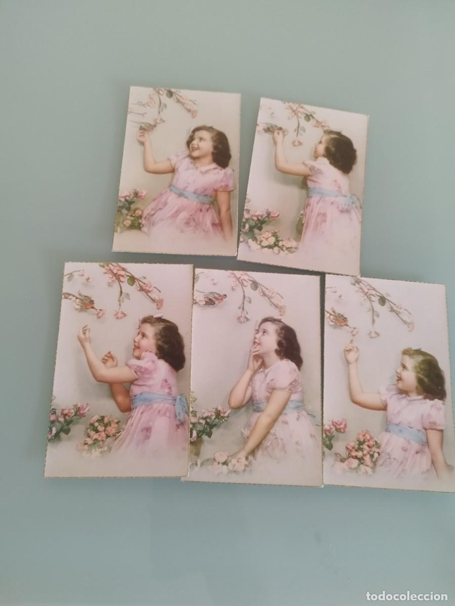 Postales: Lote de 5 antiguas tarjetas postales, de una ni&ntilde;a con vestido rosa cogiendo flores.
