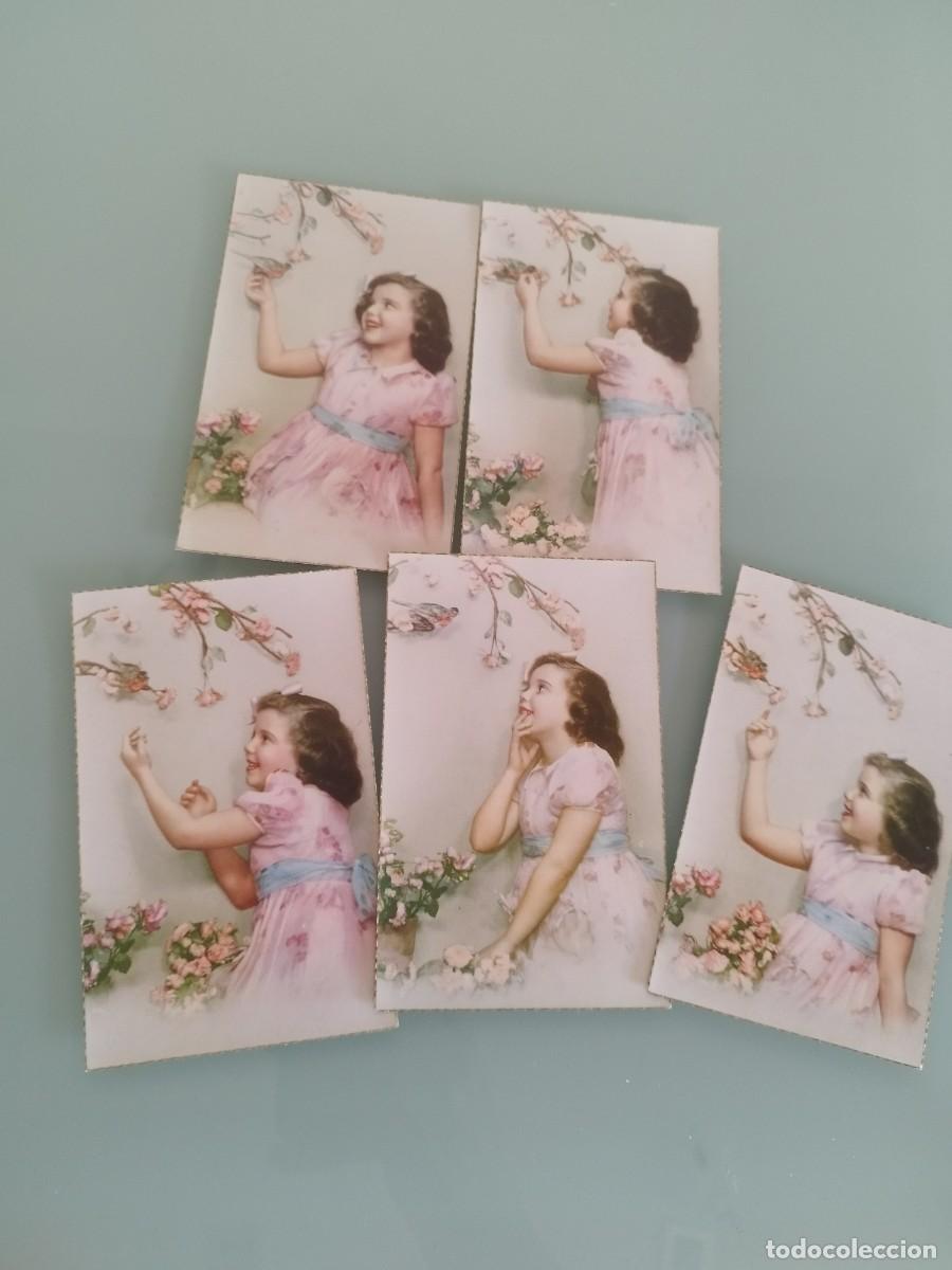 Postales: Lote de 5 antiguas tarjetas postales, de una ni&ntilde;a con vestido rosa cogiendo flores.