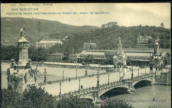 Postkarten: TARJETA POSTAL DE SAN SEBASTIAN,PUENTE MARIA CRISTINA DESDE EL PASEO DEL ARBOL DE GUERNICA. H. Y M.