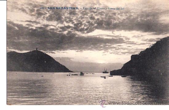 Cartoline: TARJETA POSTAL DE SAN SEBASTIAN, GUIPUZCOA. ENTRADA DEL PUERTO Y PUESTA DE SOL. N&ordm; 108 GALARZA.