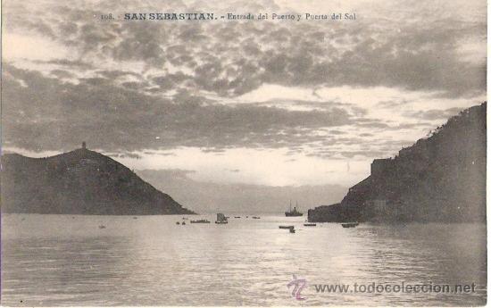Postais: TARJETA POSTAL. GUPUZCOA. SAN SEBASTIAN. N&ordm; 108. ENTRADA DEL PUERTO Y PUESTA DE SOL. ED. G. GALARZA.