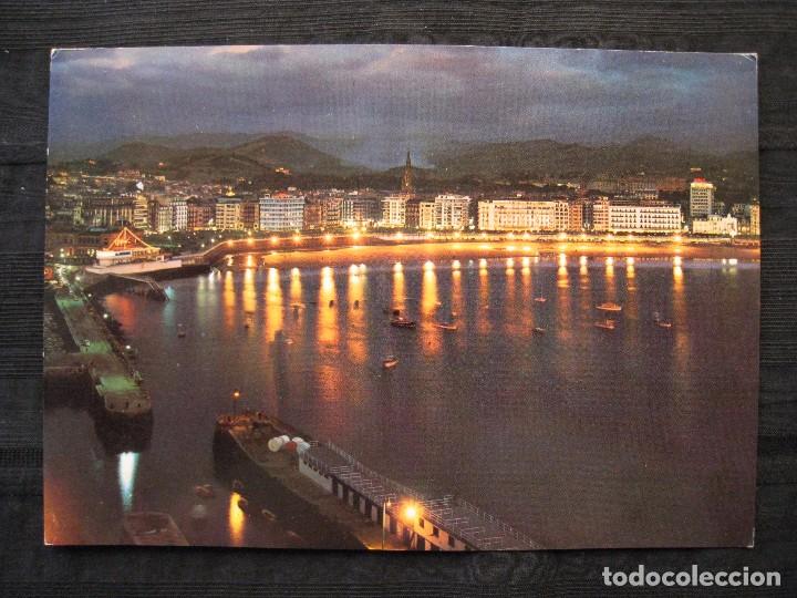 Cartoline: POSTAL SAN SEBASTIAN - VISTA NOCTURNA DESDE URGULL - CIRCULADA.