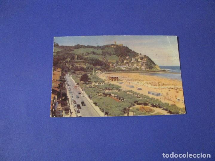 Cartes Postales: POSTAL DE SAN SEBASTIAN. PLAYA DE ONDARRETA Y MONTE IGUELDO. CIRCULADA. 1958.