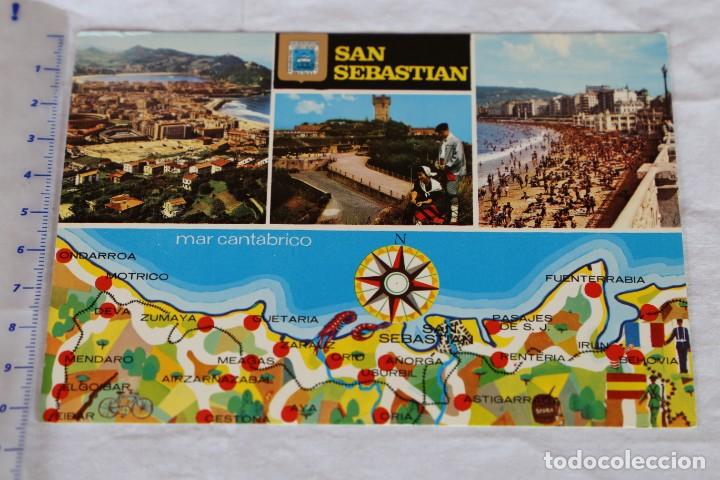 Cartoline: SAN SEBASTIAN, VISTA PANOR&Aacute;MICA MONTE IGUELDO Y PAREJA TIPICA PLAYA CONCHA- ESCUDO DE ORO N&ordm; 140