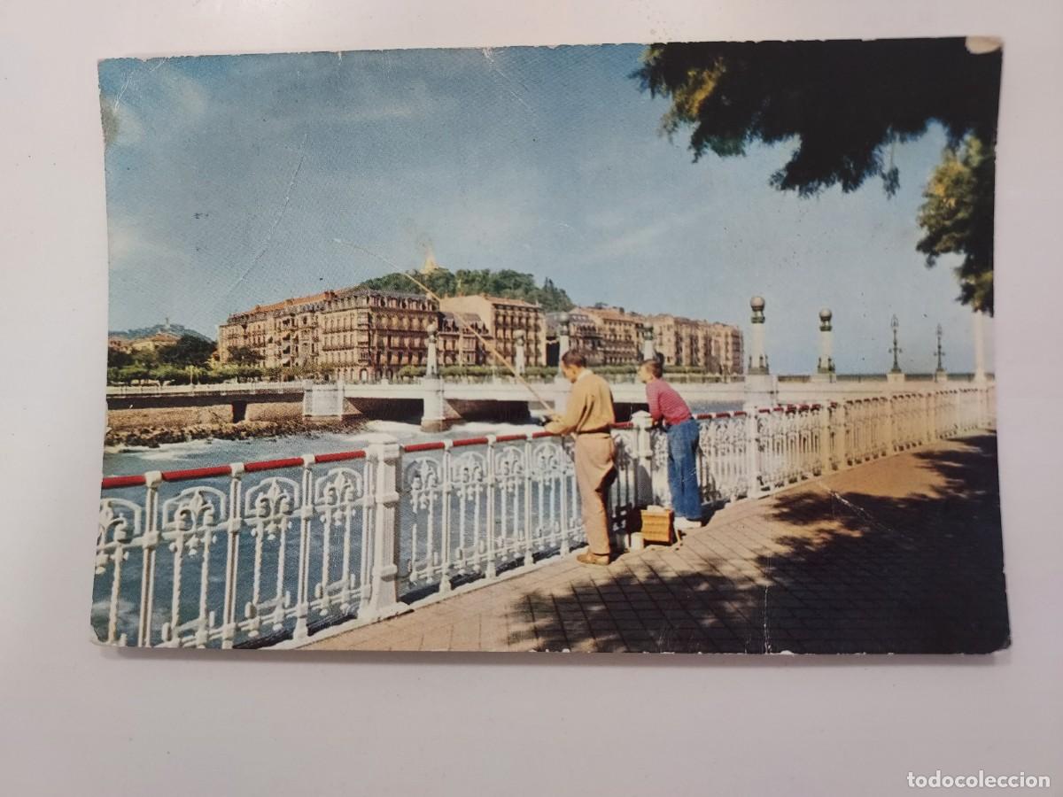 Postales: POSTAL SAN SEBASTIAN PUENTE DEL KURSAAL. 1959. CIRCULADA. AGATA. PESCADOR