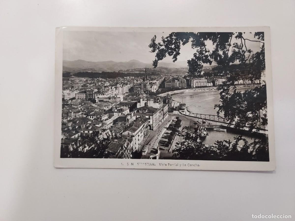 Postales: POSTAL SAN SEBASTIAN VISTA PARCIAL Y LA CONCHA. CIRCULADA 1943. ARRIBAS 1