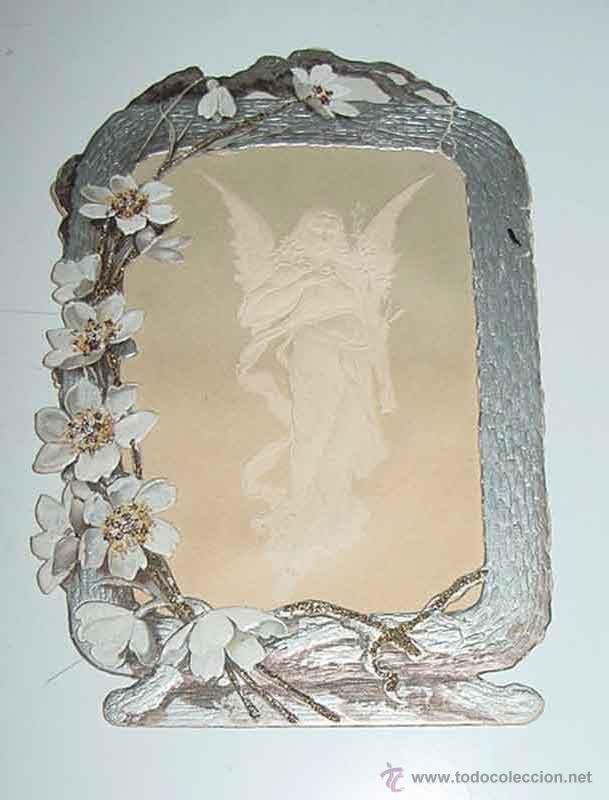 Cartoline: ANTIGUO CROMO CON MOTIVOS FLORALES, EN EL CENTRO SE APARECE UNA IMAGEN ANGELICAL SI SE MIRA AL TRASL