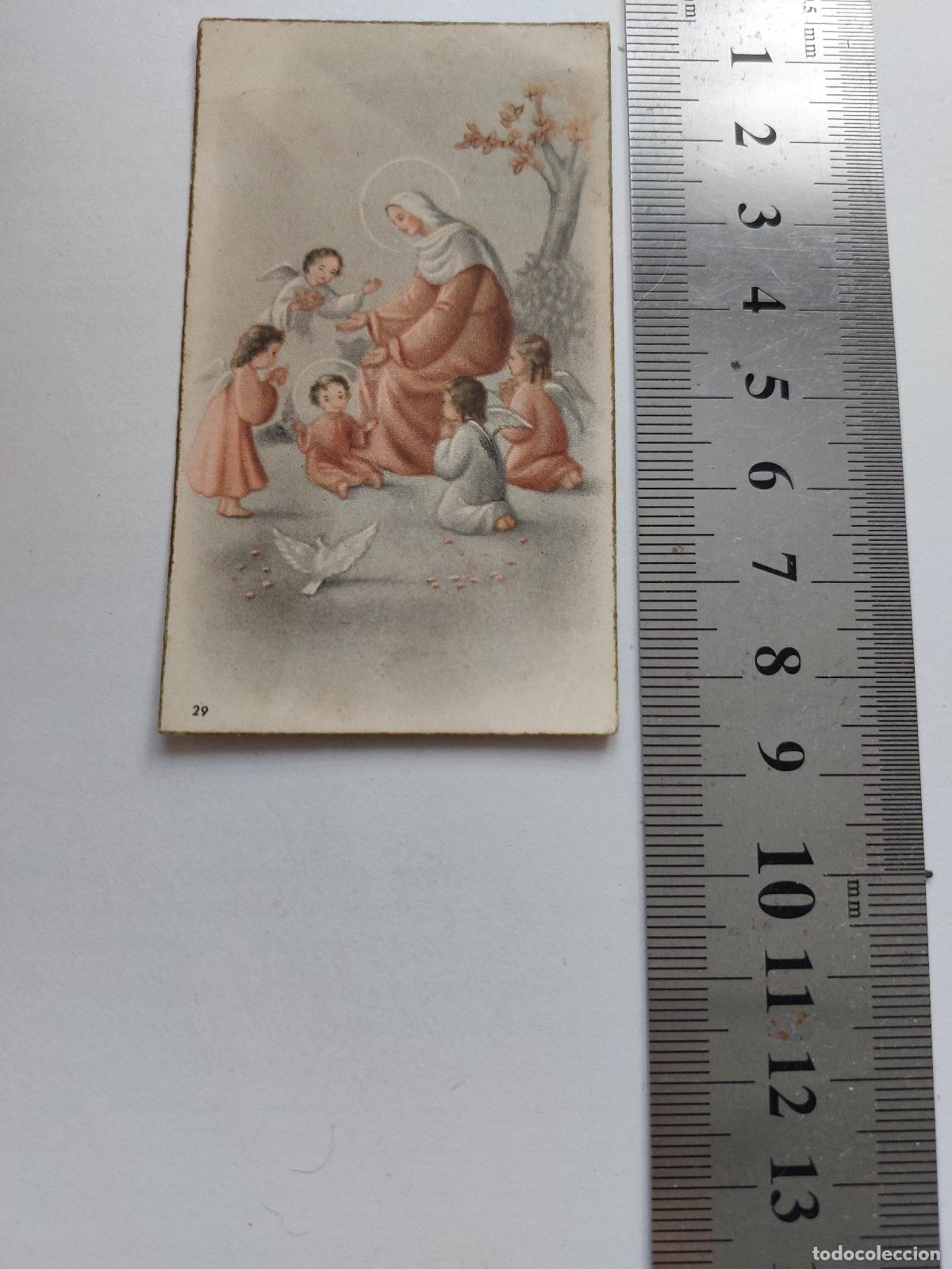 Postales: Estampa de recuerdo de primera comuni&oacute;n en la Iglesia de San Miguel en Valencia