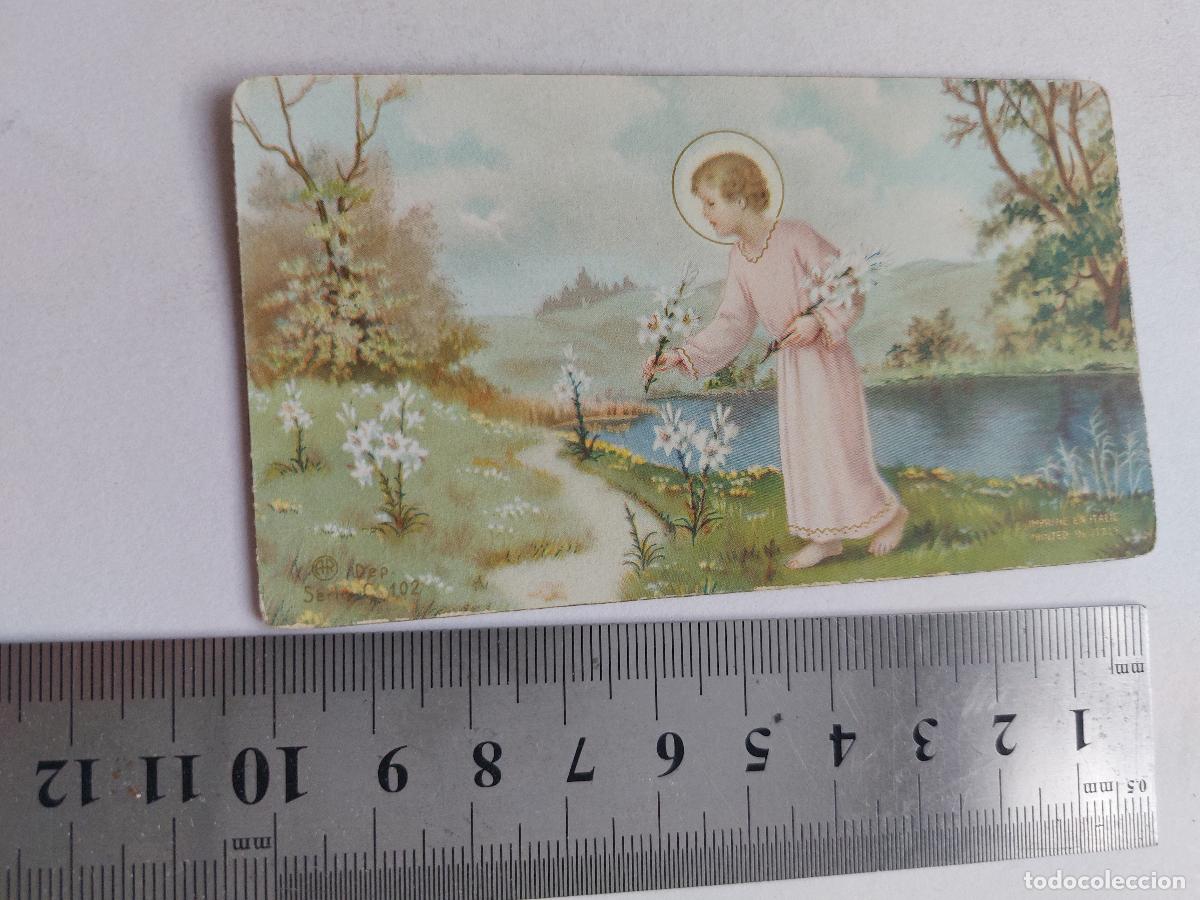 Cartes Postales: Estampa de arte religioso con &aacute;ngel y lirios en el campo