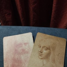 Lote de dos postales de obras en sanguina de Da Vinci