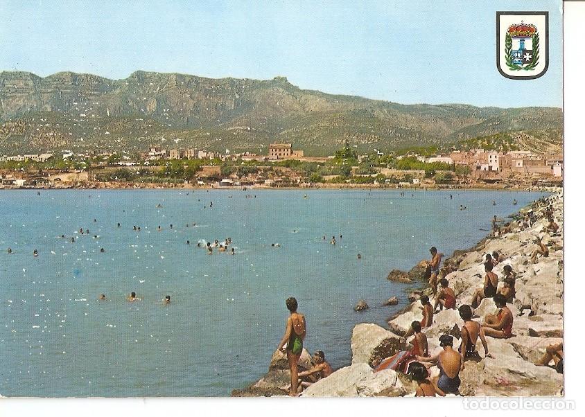 Postkarten: Postal 031582 : Costa Dorada (Tarragona). San Carlos de la Rapita. Rocas del muelle al fondo la play