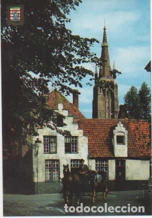 Postales: Postal E02108: Pintoresco rincon con la torre de la iglesia de ntra Se&ntilde;ora, Brugge, Paises Bajos - V
