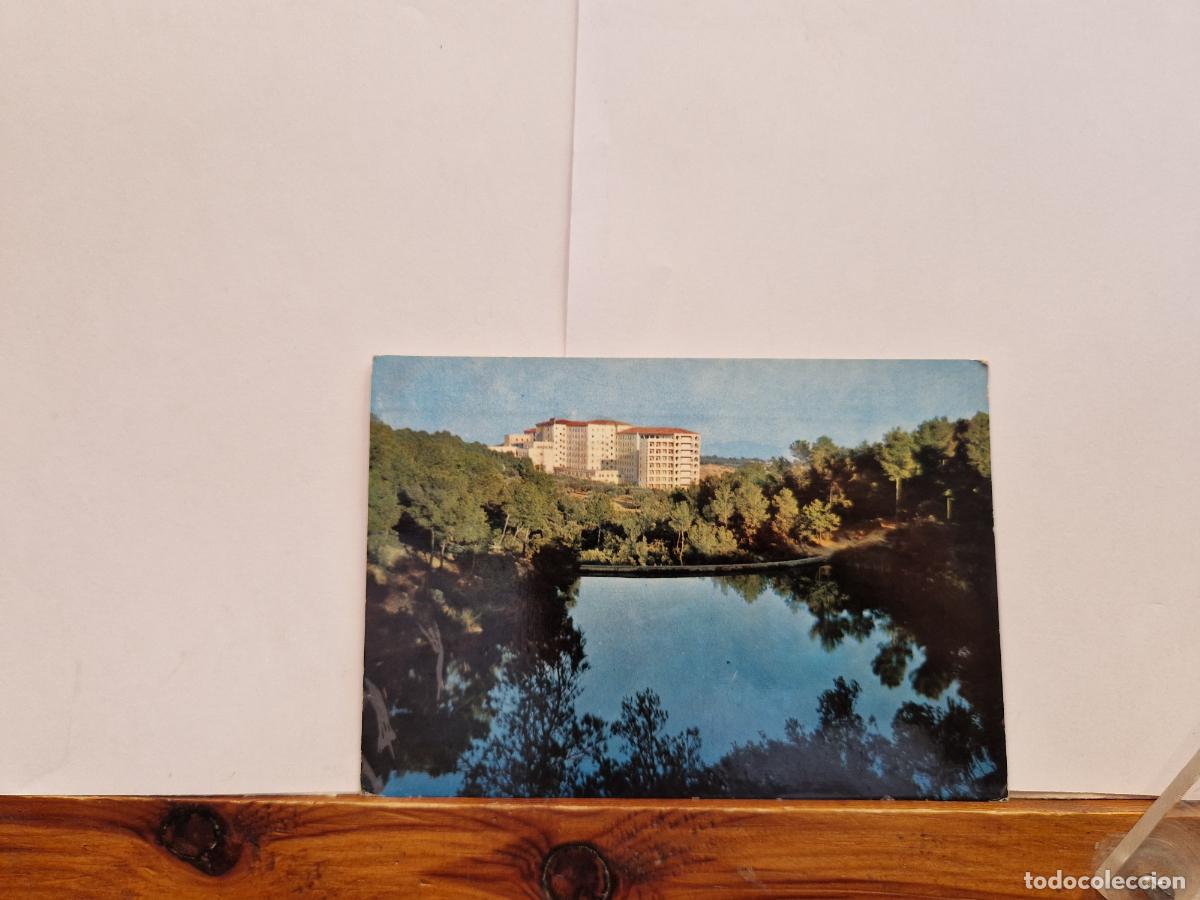Postales: BONITA POSTAL CIRCULADA. TARRASA. CUDAD SANATORIAL Y LAGO.
