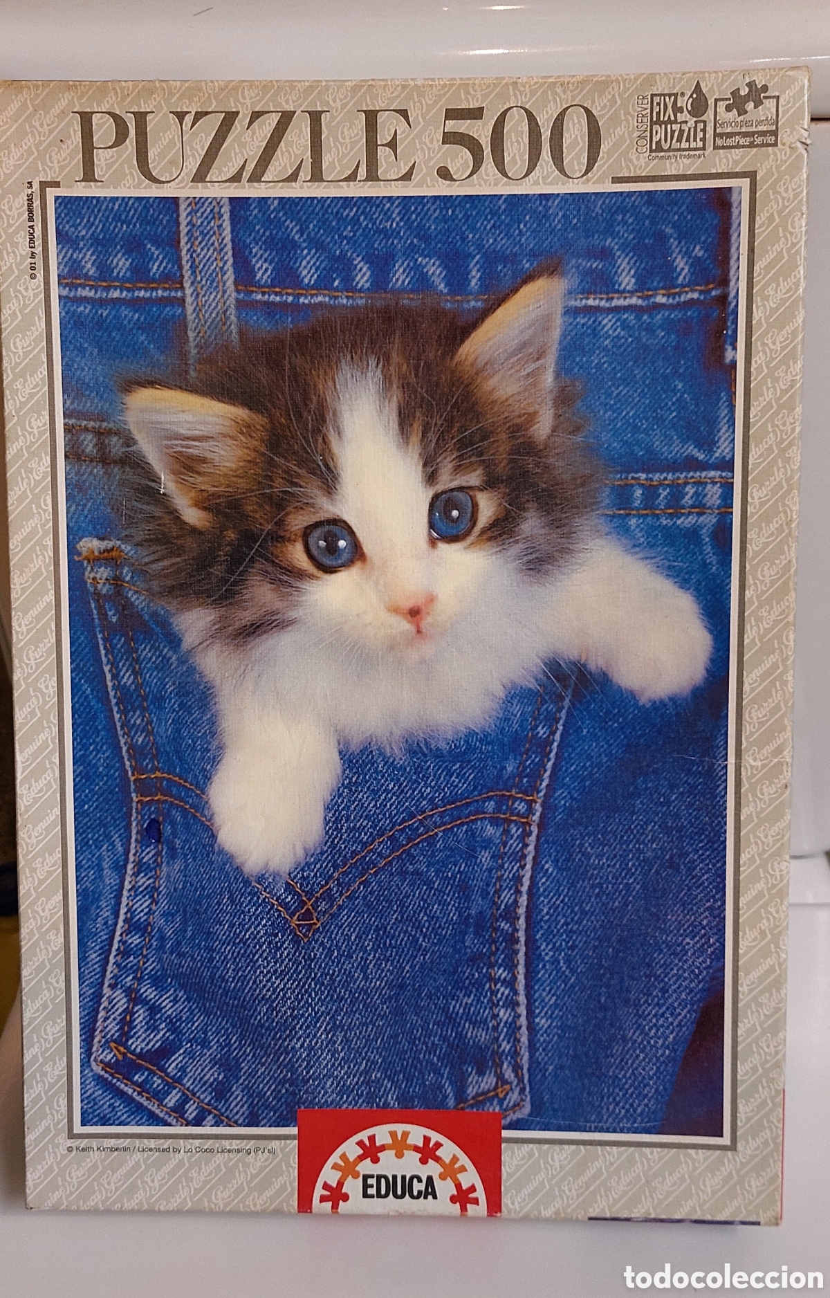 Puzzles: Puzzle marca Educa con 500 piezas, imagen de un precioso gatito dentro el bolsillo