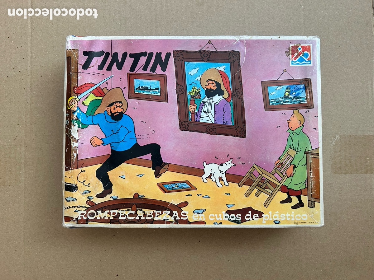 Puzzles: Tint&iacute;n Rompecabezas en cubos de pl&aacute;stico