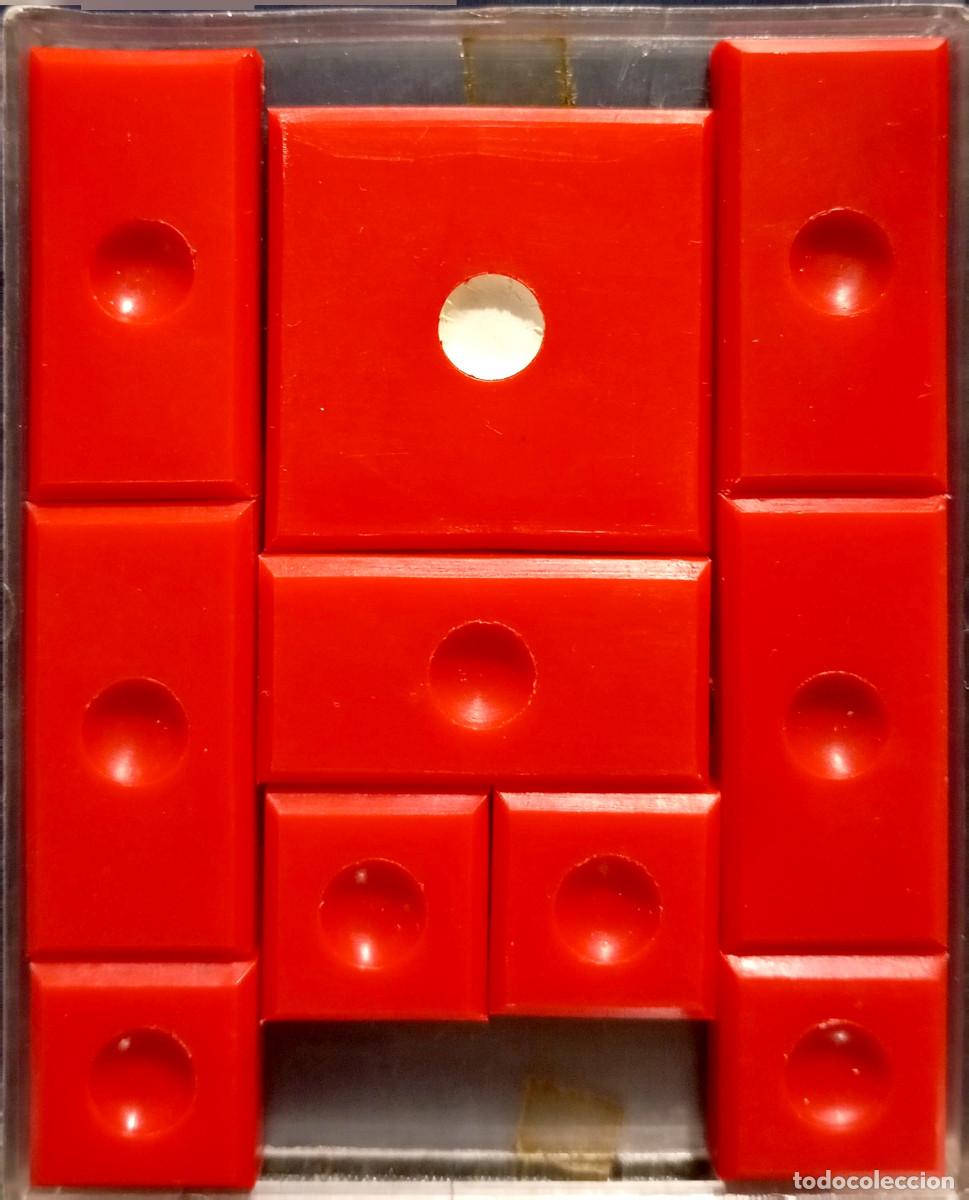 Puzzli: Juego del Topo blanco en su caja