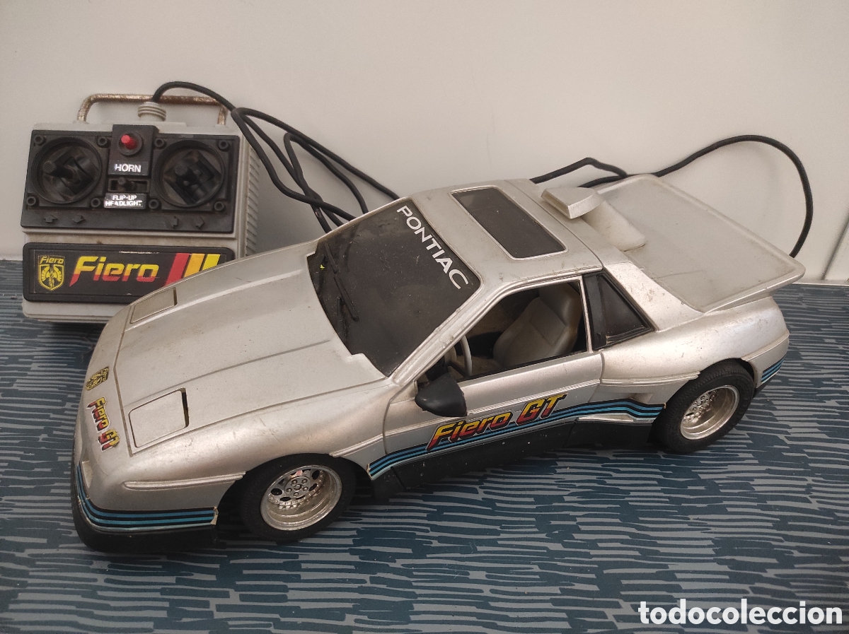 Radio control: PONTIAC FIERO - NEW BRIGHT - A&Ntilde;O 1986. Teledirigido