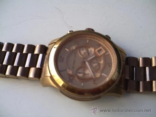 reloj marca michael kors automatico el diseña tambien ace colonias de diseño de la comunidad europea