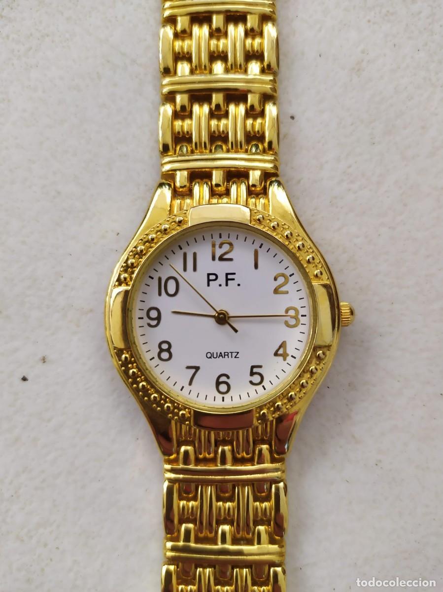 Relojes autom&aacute;ticos: 2 Relojes a pila en acabado en s&iacute;mil oro. - Foto 4