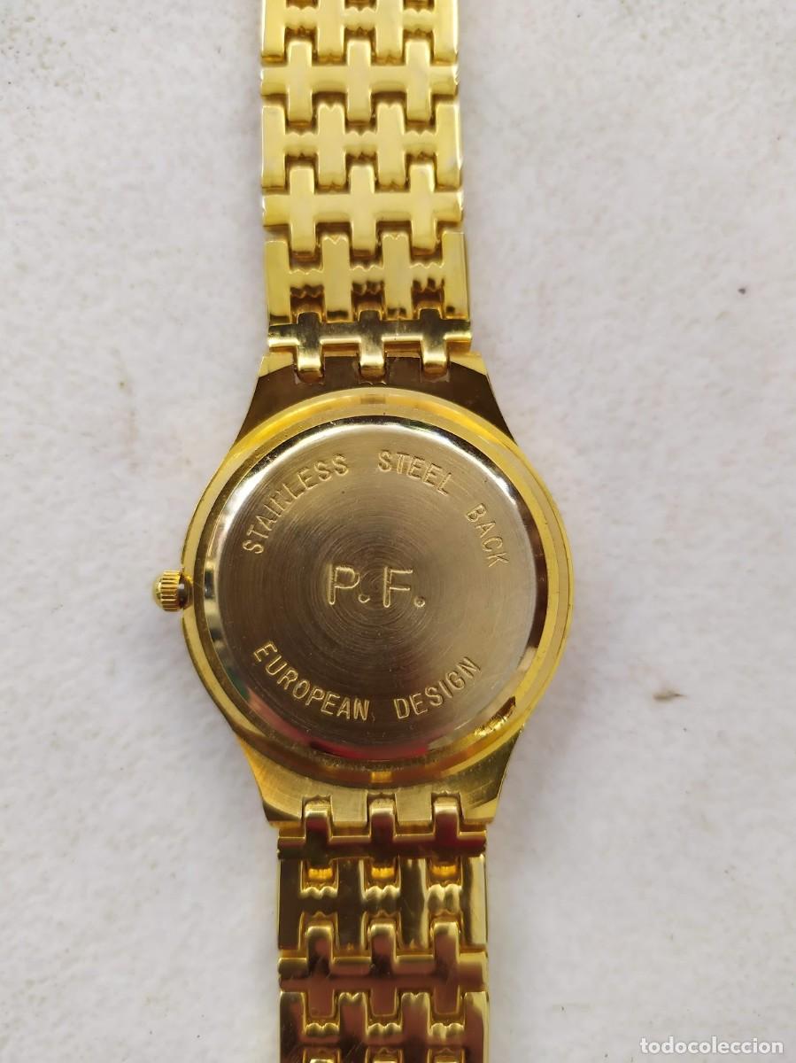 Relojes autom&aacute;ticos: 2 Relojes a pila en acabado en s&iacute;mil oro. - Foto 5