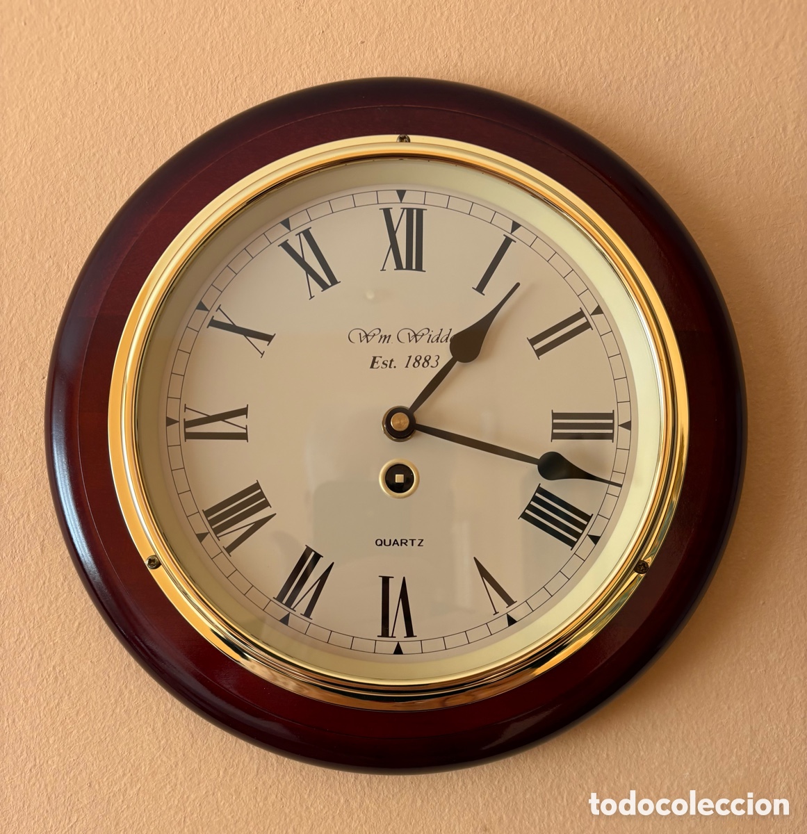 Relojes autom&aacute;ticos: Reloj madera y lat&oacute;n pared