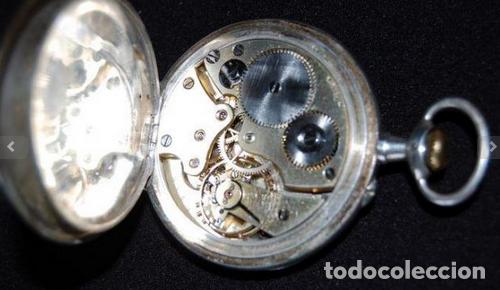 Antiguo reloj de bolsillo de orion y funcionando