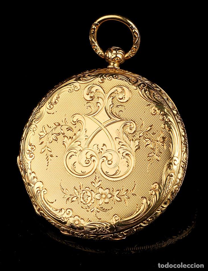 Bello reloj de bolsillo chapado en oro marca Elgin. Fabricado en EEUU circa  1900. Grabado a mano.