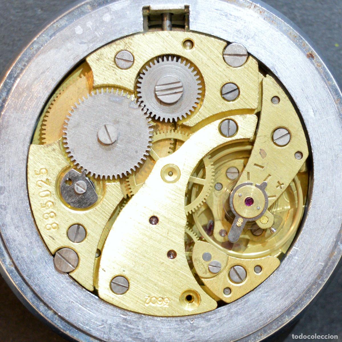 Antiguo Mecanismo De Reloj De Bolsillo Soviético En Color Sepia Con Viñeta  Blanca Fotos, retratos, imágenes y fotografía de archivo libres de derecho.  Image 64169521