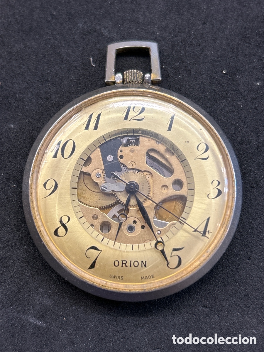 Antiguo reloj de bolsillo de orion y funcionando