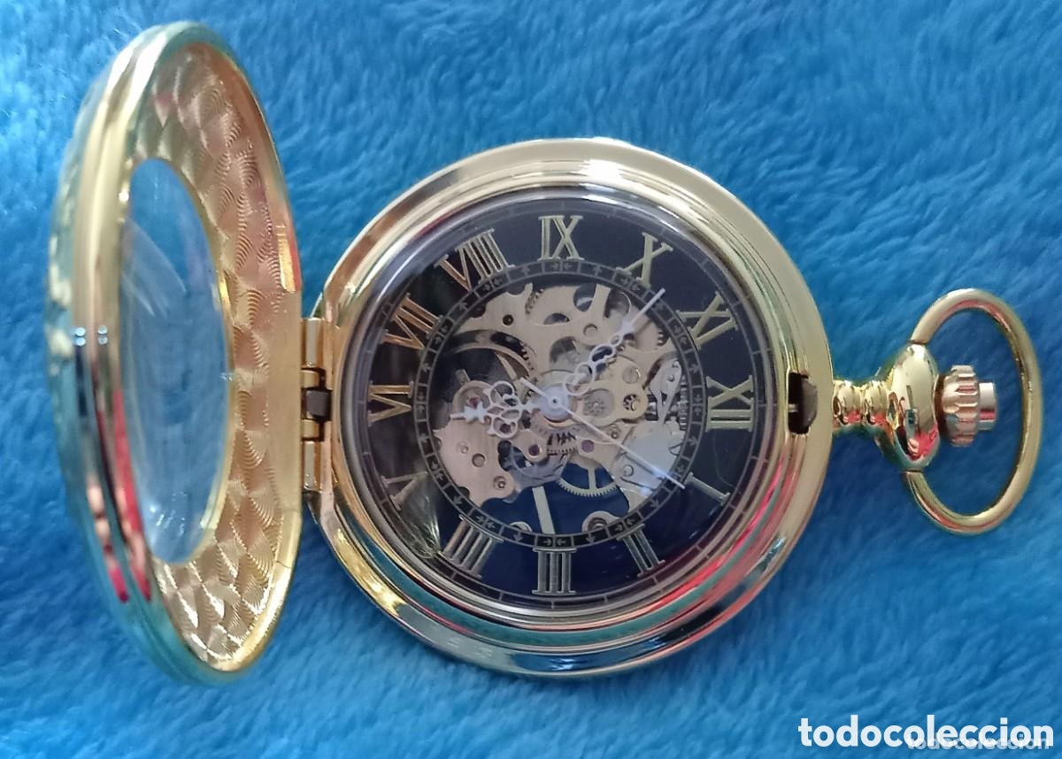 Relojes de bolsillo: Original reloj de bolsillo mec&aacute;nico, de cuerda dorado y negro con tapa transparente 4,5cm di&aacute;m. Muy