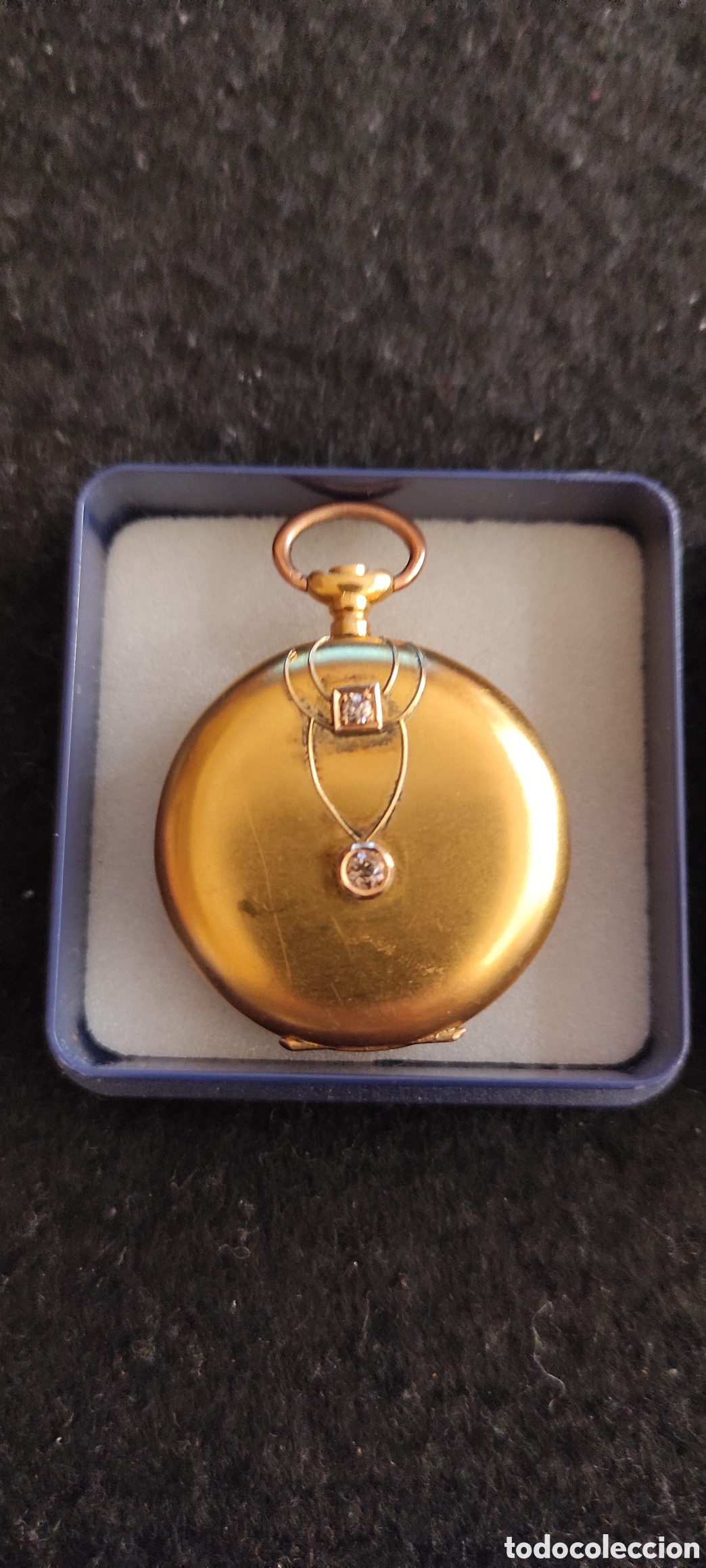 Relojes de bolsillo: Reloj saboneta de oro de 18 kilates y dos diamantes engarzados