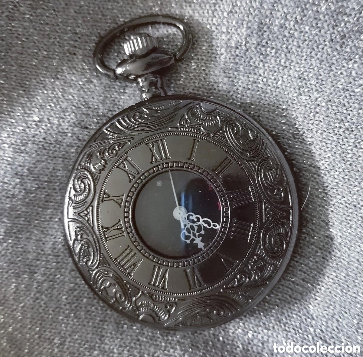 Taschenuhren: Original reloj de bolsillo de carga manual negro hueco, con tapa, filigrana. 4,5cm di&aacute;m. Muy bonito
