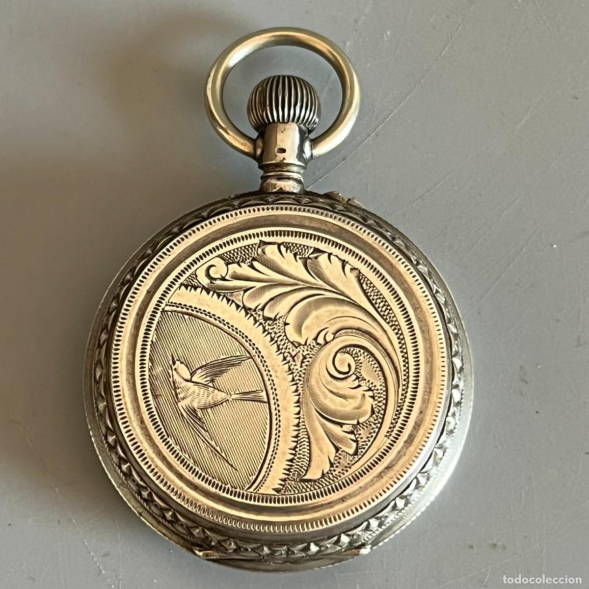 Relojes de bolsillo: Reloj plata contrastada de bolsillo. Dos tapas con decoraci&oacute;n motivos florales de p&aacute;jaros y castillo