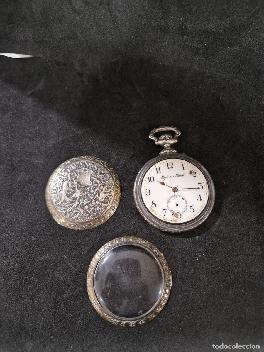 Relojes de bolsillo: Reloj de bolsillo, la maquinaria funciona.