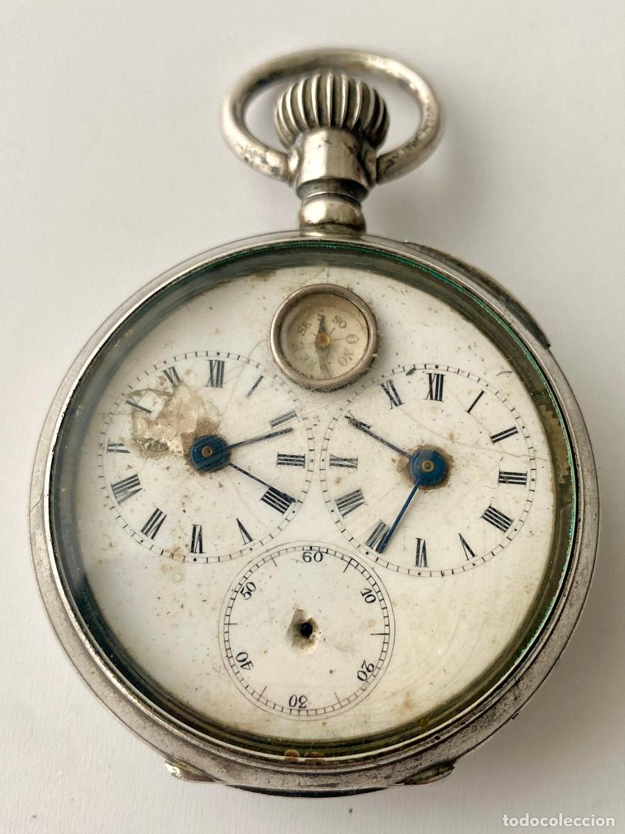 Taschenuhren: Reloj de bolsillo de doble huso horario con br&uacute;jula integrada. Caja plata. Suiza c1890