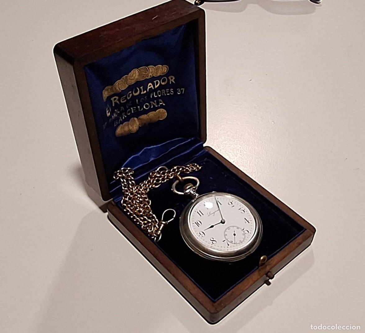 Relojes de bolsillo: Reloj Longines con cadena y caja.