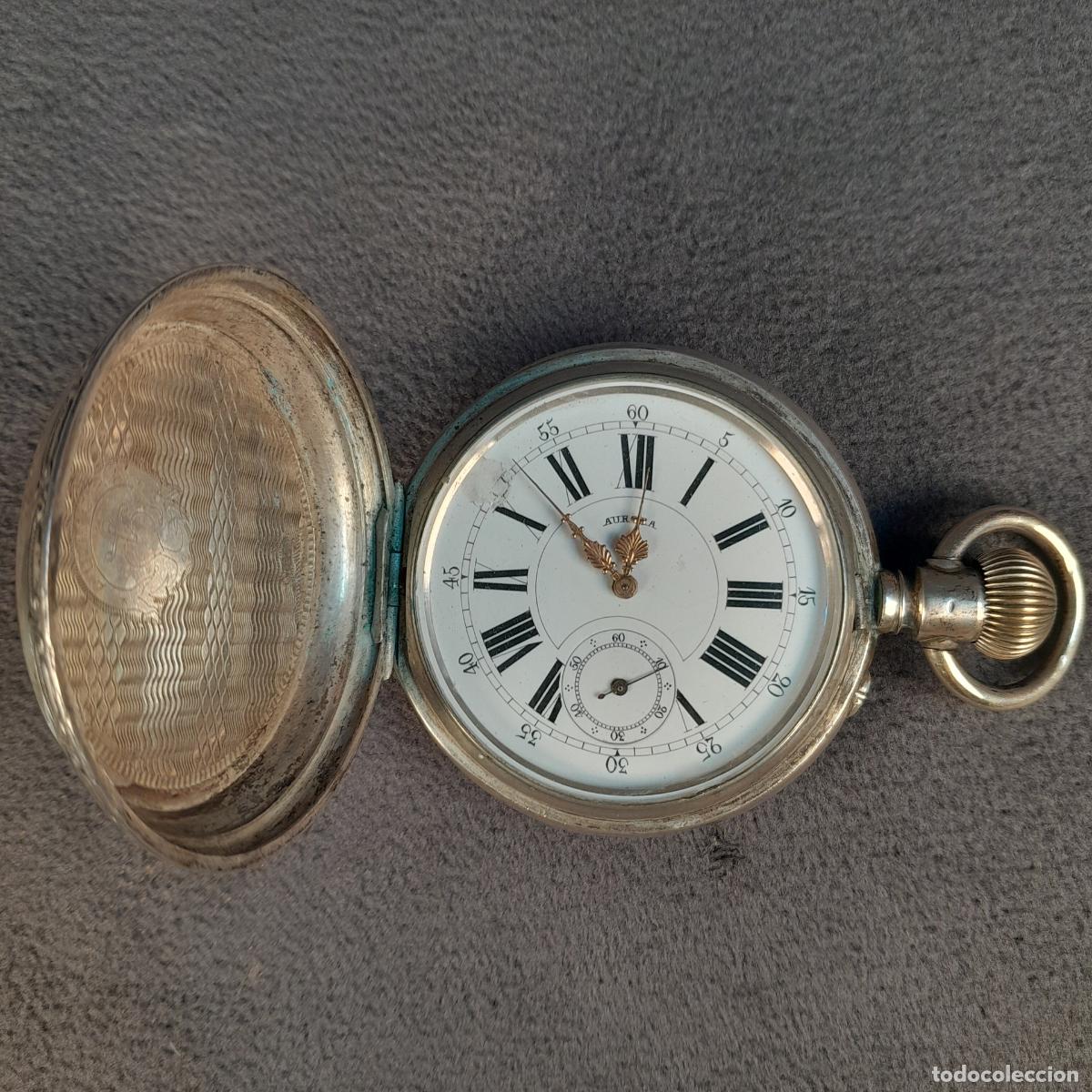 Relojes de bolsillo: R-455. RELOJ DE BOLSILLO SABONETA AURORA EN PLATA 800. MOVIMIENTO DE CUERDA. 1900 CA.