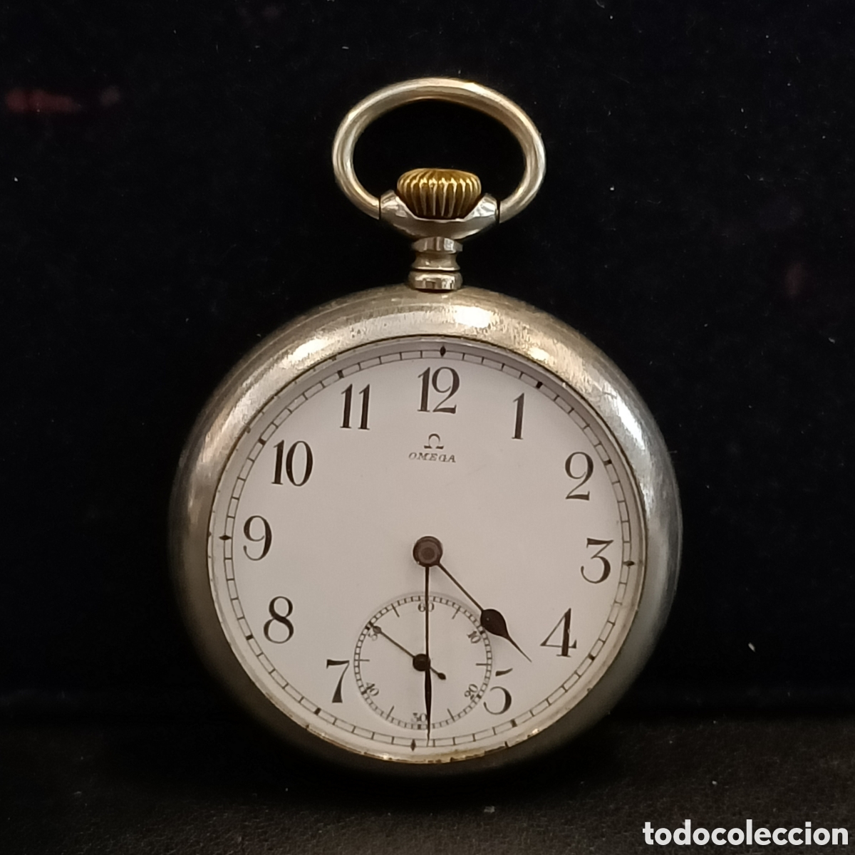 Relojes de bolsillo: Reloj de bolsillo de carga manual de la marca OMEGA.