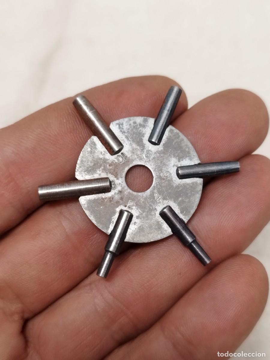 Rel&oacute;gios de bolso: Antigua llave de estrella , para dar cuerda a relojes antiguos de bolsillo.