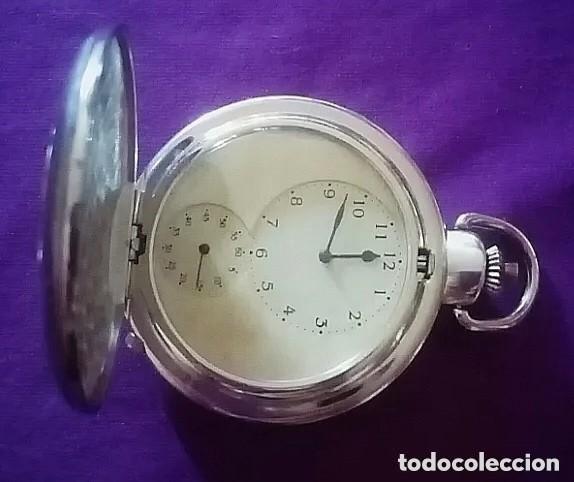 Taschenuhren: Original reloj de bolsillo plateado y dorado con 2 movimientos, esferas, decorado con filigranas 5cm