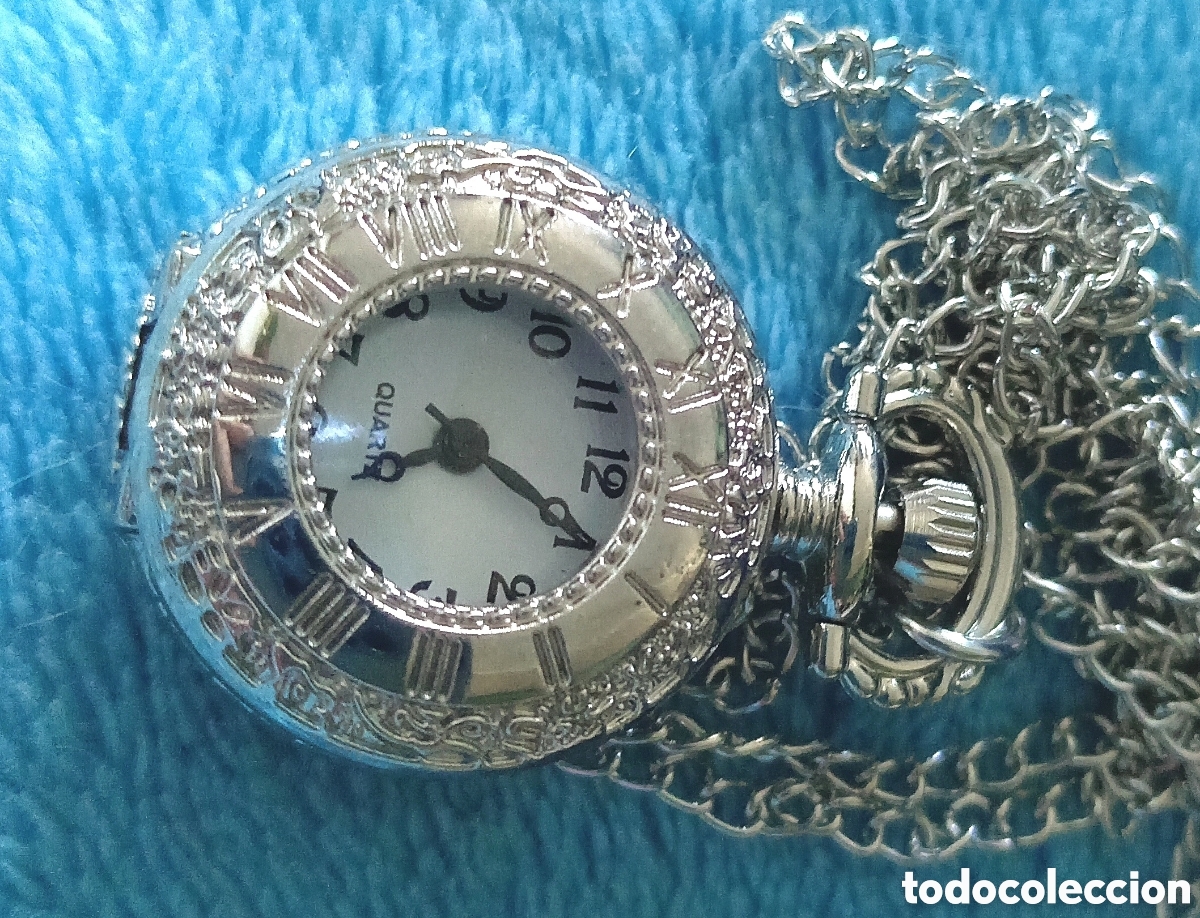 Montres de poche: Original peque&ntilde;o reloj de bolsillo de carga manual con tapa hueco plateado decorado con filigranas 2